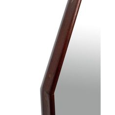 a close up of a mirror with a wooden frame and wood grain on the bottom