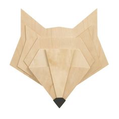 three wooden cutouts of a fox's head