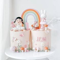 Miffy in the meadows on an adorably detailed double column cake with the prettiest rainbow for a beautiful first birthday celebration! Shades of pink filled with moist layers and delicious flavour and the cutest fondant figurine of the birthday girl!  For orders and enquiries, we can be contacted via whatsapp at +65 82817688! ✨  #bakerysg #sgcakes #sgevents #bespokecakes  #sgbirthdaycakes #customisedcakesg #customcake #specialtycakes #weddingcake #childrenscake #cakesofinstagram #edibleart #cakecreations #artisancake #cakedesign #cakedecorating #cakedesign #cakeart #cakesofig #meadowcake #pinkcake #firstbirthdaycake #miffy #miffycake #rainbowcake Birthday Cake First Year Girl, Birthday Cake First Year, Dream Birthday Cake, Miffy Cake, Fondant Figurine, Matcha Strawberry, Deco Cake, Cake Designs For Girl, Dream Birthday