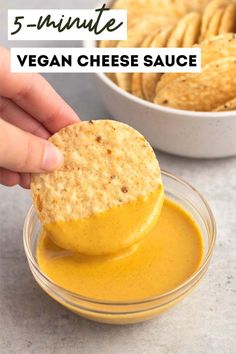 vegan cheese sauce in a bowl with crackers on the side and text overlay that reads 5 minute vegan cheese sauce