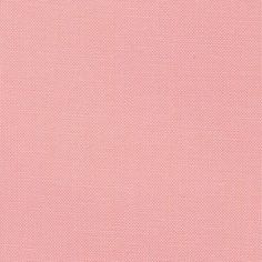 a pink background that is very soft and has small dots on it, as well as the