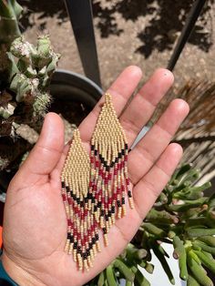 Beautiful beaded earrings with chevron fringe. 1 inch wide, 4 inches long. Cherry Blossom Jewelry, Beautiful Beaded Earring, Gold Bead Earrings, Beaded Earrings Native, Beaded Fringe Earrings, Chino Hills, Oversized Earrings, Seed Bead Patterns, Tourmaline Earrings