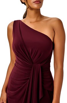 Steal the show anywhere you go in this jersey gown topped by a dainty one-shoulder neck and finished with a drapey detail. 60" length (size 8) One-shoulder neck Lined 95% polyester, 5% elastane Dry clean Imported One Shoulder Dark Red Dress, Maroon Evening Gown, Formal Dresses Long Elegant, One Shoulder Evening Dress, Long Dresses Elegant, Review Dresses, Straight Skirt, Floor Length Dresses, Adrianna Papell