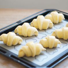 small pastries on a baking sheet ready to go into the oven or bake