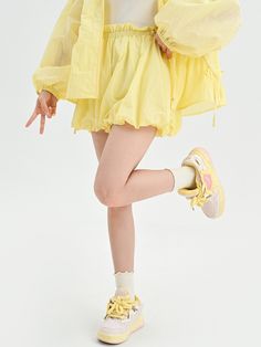 Add a touch of kawaii charm to your wardrobe with our milk-yellow high-waist bubble shorts. These adorable shorts feature a high-waisted design that accentuates your curves and creates a flattering silhouette. The bubble design adds a playful and feminine touch, perfect for creating a cute and stylish look. Pair them with your favorite crop top or blouse for a fun and flirty outfit.  Please note that this product includes only one pair of shorts.  Garment Size   	 		 			Size 			S 			M 			L Striped Shorts Outfit, Bubble Shirt, Bubble Shorts, Flirty Outfits, Steampunk Fashion Male, Gothic Skirts, Bubble Design, 2024 Style, Yellow Outfit