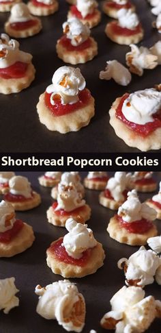 shortbread popcorn cookies are topped with whipped cream and jelly in the shape of santa's hat