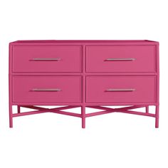 a pink dresser with four drawers on it