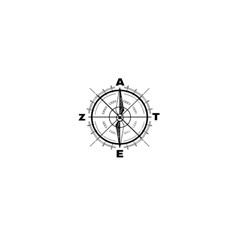 a black and white photo of a compass with the letter e in it's center