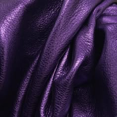 a purple leather background with the text $ 1 75 ebay on it in blue