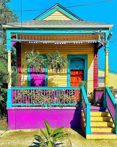 a colorful house is painted in bright colors