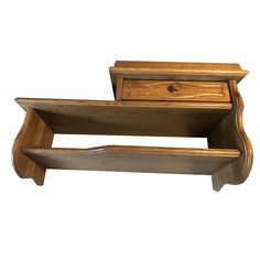 a wooden shelf with two drawers on it