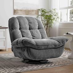 a reclining chair sitting on top of a rug in a living room next to a potted plant