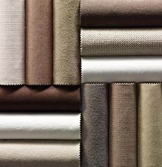 several different shades of fabric on top of each other, including brown and beiges