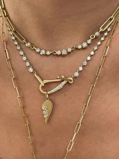 Jade Trau diamond necklaces, handcrafted in 18-karat yellow gold. Featuring our Paige Diamond Chain Necklace, Lola Diamond Line Necklace with our Friendship Heart Charm Diamond Chokers, Friendship Heart