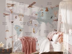 a child's bedroom with a world map wallpaper