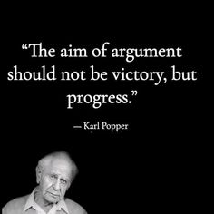 an old man is sitting in front of a black background with a quote from karl popper