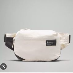 Brand New With Tags Attached Lululemon Athletica Clean Lines Belt Bag Color: White Opal With Plenty Of Pockets, This Belt Bag Keeps Items Organized When You're On The Go. An Exterior Pocket Provides Easy Access To Small Essentials Like Lip Balm And Hand Sanitizer. Designed For On The Move Product Features Exterior Zippered Pocket To Secure Your Valuables Interior Mesh Fabric Pocket With Key Loop Bag Dimensions: 20cm X 6.5cm X 15cm (7.9" X 2.6" X 5.9") Strap Length When Fully Extended: 100cm (39. Women's Bags By Shape, Opal Color, Water Repellent Fabric, Workout Outfit, Running Clothes, White Opal, Hand Sanitizer, Mesh Fabric, Belt Bag