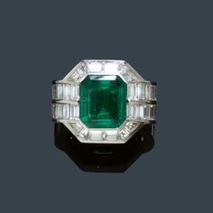 EMERALD AND DIAMOND RING, E. LOOSLI, circa 1950. White gold 750. 1 single-cut very fine Columbian emerald of ca. 10.00 ct, 20 baguette-cut diamonds of a total of ca. 2.80 ct, 12 baguette-cut diamonds of a total of ca. 0.60 ct. Sold for CHF 102 000 buyer's premium incl. Treasure Room, Gold Jewelry Gift, Man Ring, Statement Rings Diamond, Unique Diamond Rings, Bridal Ring Sets, Cushion Diamond