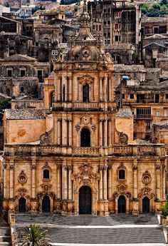 an old church in the middle of a city