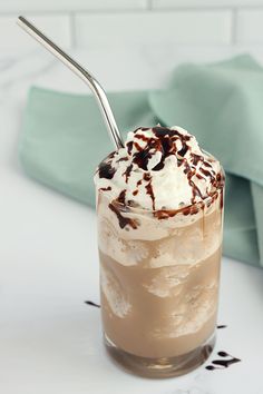 a drink with whipped cream and chocolate on top