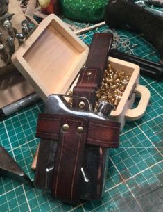 an assortment of crafting tools on a table