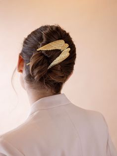 The pièce de résistance of the season, we bring you the Genevieve Hair Pin. Twist into any updo for the most artistic stunning scene imaginable. This pin can hold tons of hair and can slide into any hairstyle. 14K Gold Plated. Measures: 5.25" in height, 2.75" in width Made in NYC. Epona Valley, Luxury Hair Accessories, Guest Hair, Gold Hair Pin, Wedding Guest Hairstyles, Long Locks, Hair Braids, Luxury Hair, Modern Hairstyles