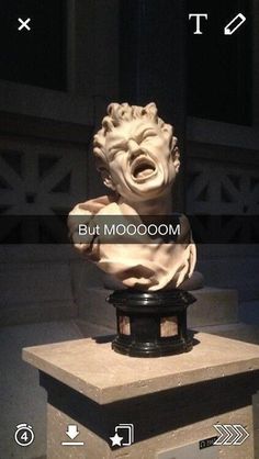 a statue with its mouth open and the words but moooom above it