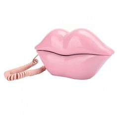 a pink telephone is connected to a lip