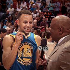 the golden state warriors player is interviewed by an announcer