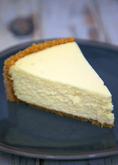 a piece of cheesecake on a blue plate