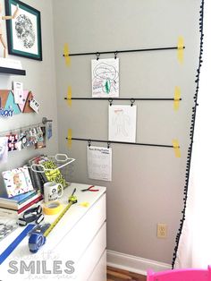 a child's room with yellow sticky notes on the wall