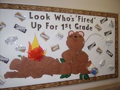 a bulletin board that says, look who's fired up for 1st grade on it