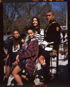 a group of young people standing next to each other