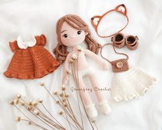 crocheted doll and accessories laid out on a white sheet with text that reads, free crochet pattern for dolls