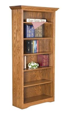 Ready to fit in right where you need it, the Amish Woodville Bookcase offers storage and display for books and more. This solid wood bookcase is ideal for your office furniture collection, but makes a great addition to the hallway, family room or bedroom as well. This solid wood bookcase helps to organize wherever you need it. Whether it's office items and manuals, children's toys, a library of books or your precious photo albums with some framed shots displayed as well, an Amish made bookcase is just the right custom furniture to provide a lovely showcase. Offering six shelves and a lovely display top, this is Woodville style furniture through and through. The design is simple and functional and blends well with contemporary or traditional décor. Browse more of our popular Woodville style Furniture Construction, Quarter Sawn White Oak, Office Bookcase, Oak Bookcase, Face Frame, Solid Wood Shelves, Wide Face, Wood Bookcase, Amish Furniture