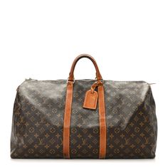 This is an authentic LOUIS VUITTON Monogram Keepall 55. This bag is crafted of signature Louis Vuitton monogram on toile coated dark brown canvas. The bag features a vachetta cowhide leather trim, rolled top handles, and polished gold hardware. The top zippers open the bag to a spacious cocoa brown fabric interior. Louis Vuitton Monogram Bag, Pop Stitch, Louis Vuitton Travel, Louis Vuitton Crossbody Bag, Louis Vuitton Crossbody, Louis Vuitton Keepall, Cocoa Brown, Monogram Bag, Brown Fabric