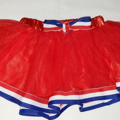 Baby Girl's Red Tutu Skirt Lined Size: 12 Months Brand New. Chiffon Skirt Lined In A Satin Skirt Elastic Waistband With Bow Accent The Hem Of The Skirt Is Trimmed With A Red, White And Blue Ribbon New Without Tags Orange Ribbon Skirt, Infant Ribbon Skirt, Red Mini Skirt With Elastic Waistband, Red Tutu Skirt, Red Tutu, Baby Tutu, Chiffon Skirt, Satin Skirt, Tutu Skirt