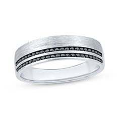 a white gold wedding band with black diamonds