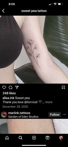 the back of a woman's arm with flowers on it and an inscription that reads sweet pea tattoo