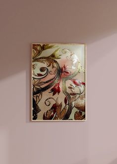 a painting hanging on the wall above a bed in a room with pink walls and flooring