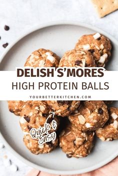 a white plate topped with cookies covered in nuts and text that reads delish's mores high protein balls