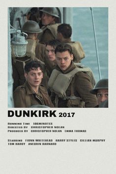 the movie poster for dunikik is shown in front of some men on a boat