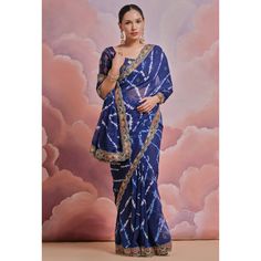 Blue colored saree is made from georgette fabric which is highlighted with beautiful printed work as shown. Comes along with unstitched mono silk blouse piece which you can customise as per your design/style. Occasion - You can wear this saree for party, functions and fashionista. Note:- the actual product may differ slightly in color and design from the one illustrated in the images when compared with computer or mobile screen. Measurements: Saree : Georgette : 5.5 Mtrs Blouse : Georgette : 0.8 Blue Georgette Saree With Floral Embroidery, Semi-stitched Blue Saree With Embroidered Border, Blue Pre-draped Saree With Printed Border, Blue Georgette Saree With Printed Border, Blue Semi-stitched Saree With Printed Border, Baby Skin Care, Silk Lehenga, Georgette Fabric, Georgette Sarees