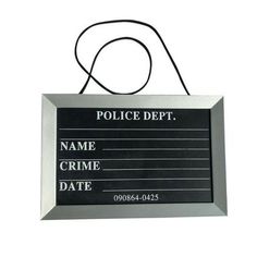 a police sign hanging from the side of a metal frame with a name and date on it