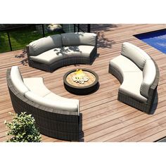 an outdoor patio furniture set on a wooden deck next to a swimming pool with a fire pit