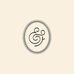 the logo for an artisan shop, called e & f with a circular frame