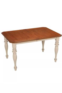 a wooden table sitting on top of a white floor