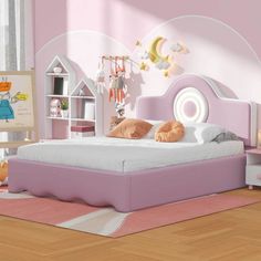 a child's bedroom with pink walls and white furniture, including a bed frame