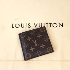 Data Code: Ca0172 Was Suppose To Be A Gift But He Didn’t Want It. Brand New Never Used Authentic Louis Vuitton Mens Wallet. Only Thing Wrong Is A Little Peeling On The Coin Department(Shown On The Last Picture) But Not Noticeable At All. Dust Bag And Box Included Monogram Canvas Rectangular Wallets As Gifts, Designer Tan Wallet, Luxury Tan Travel Wallet, Designer Monogram Rectangular Wallet, Designer Rectangular Monogram Wallet, Luxury Wallet In Monogram Canvas, Luxury Monogram Canvas Wallets For Everyday Use, Designer Rectangular Wallets With Logo, Designer Tan Wallets For Travel