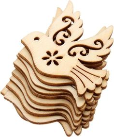 wooden cutouts of birds with swirls and scrolls on the wings, set of 10